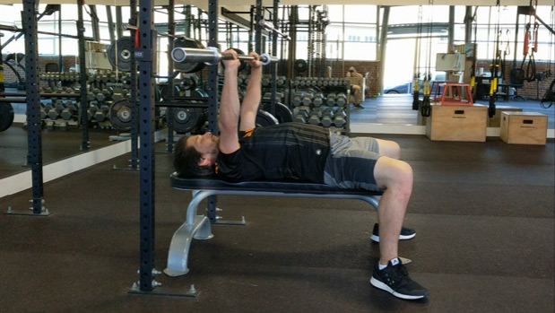 Unracking and racking the bench press